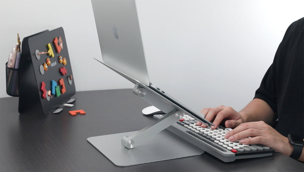 Elevate Your Work Game: Why You Need a Laptop Stand and a Mechanical Keyboard